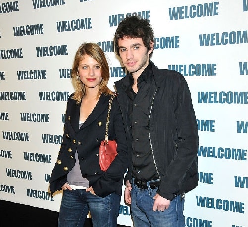 Melanie Laurent posing with her brother Mathieu Laurent.